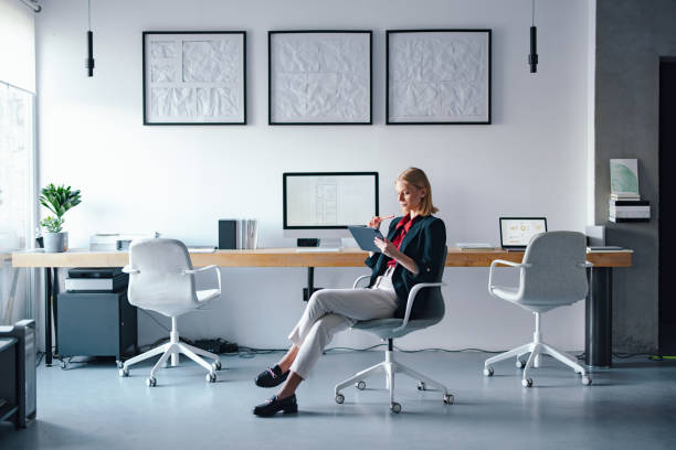 istock Professional Woman Working in a Modern Office with Stylish Design Elements 2193393885