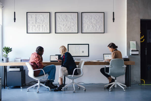 istock Business Team Collaborating in a Modern Office Environment 2193393920
