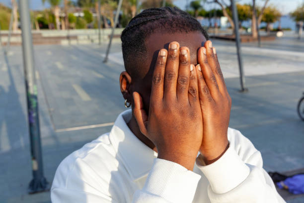 istock Portrait of afro men hands on face 2193394303