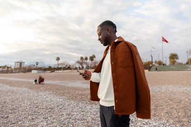 istock Portrait of afro men using phone 2193395636