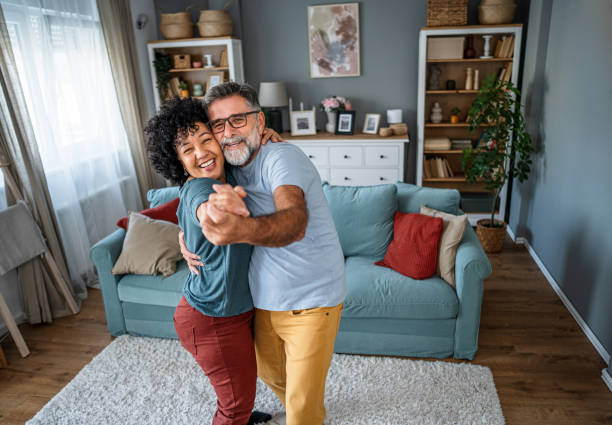istock Joyful mature couple having fun at home 2193396509