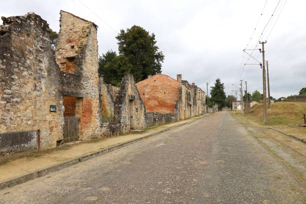 istock Oradour sur Glane - Old street lined with ruins 2193397069