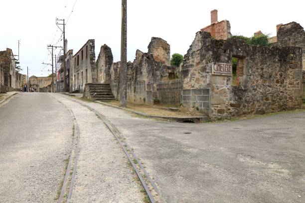 istock Oradour sur Glane - Old street lined with ruins 2193397141