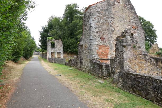 istock Oradour sur Glane - Old street lined with ruins 2193397187