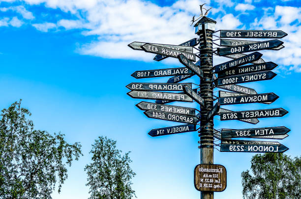 istock A signpost with many different signs pointing in different directions 2193398298