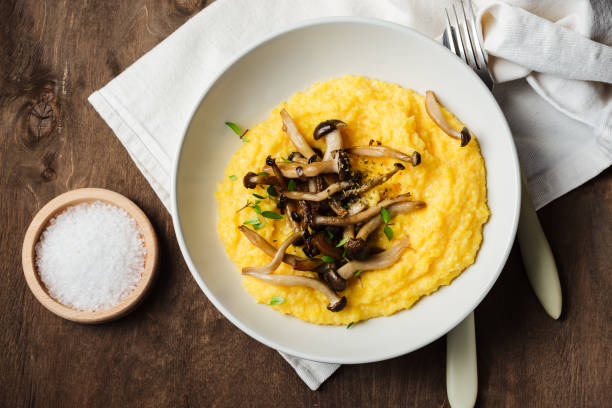 istock Creamy polenta with roasted shimeji mushrooms. 2193407942