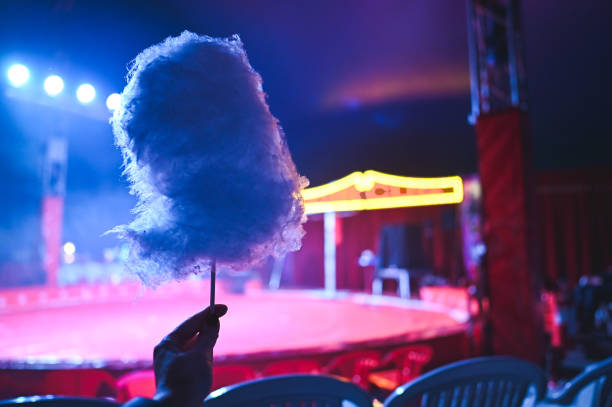 istock Eating sweet cotton sugar at circus. 2193410437
