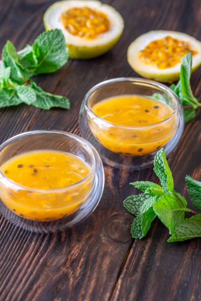 istock Passion Fruit Pulp in Glass Bowls on Rustic Wood 2193411983