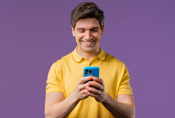 istock Handsome man surfing internet on smartphone. Guy using social networks, chatting 2193416071