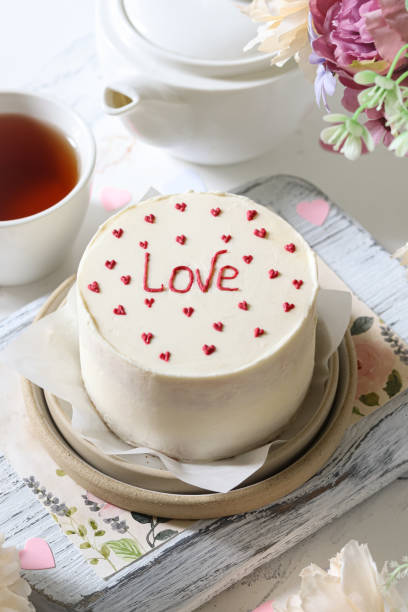 istock Delightful cake decorated with love and served with tea on a charming tray 2193418804