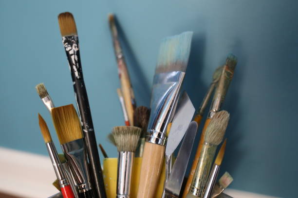 istock Artist Paint Brushes with Blue Background 2193419383