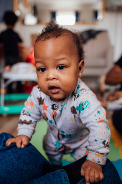 istock Toddler trying to stand up 2193429982