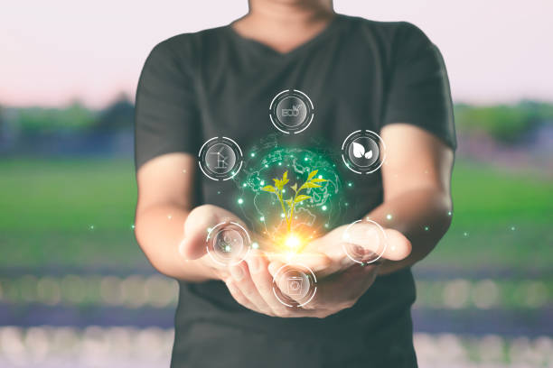 istock person hold icon to save energy,and reduce global warming,climate change,ecology friendly investment,ESG environment social governance,Green Business Innovation and Sustainable Development concept. 2193431811