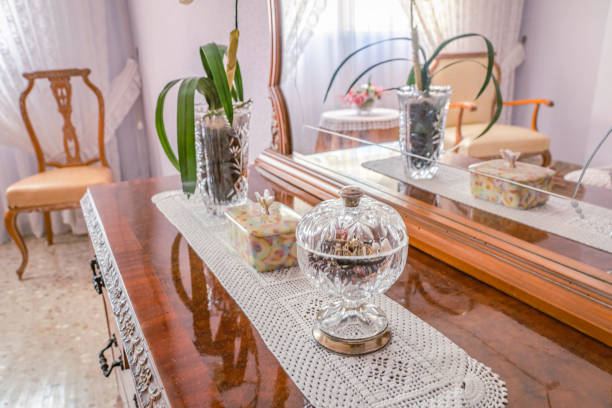 Sideboard cabinet with mirror in vintage room. Grandmacore Aesthetic