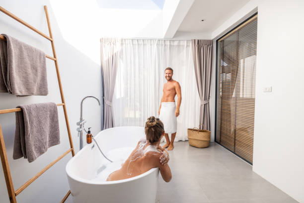 istock Cozy Moments: A Couple Enjoying a Relaxing Bath Together at Home 2193444719