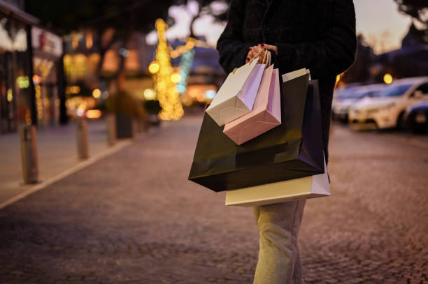 istock Woman with shopping bags 2193444943