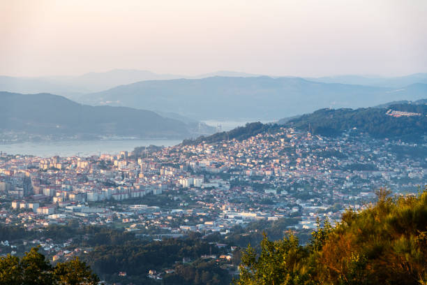 Aerial view of the urban landscape of the city of Vigo in Galicia, Spain, at sunset.