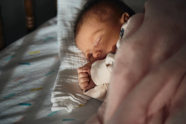 istock Sleeping newborn baby girl 2193448682