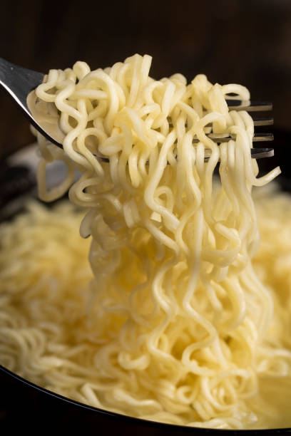 istock details of flour noodles with eggs during cooking 2193448888