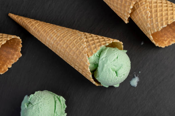 istock green ice cream with mint flavor on a black slate surface 2193449023