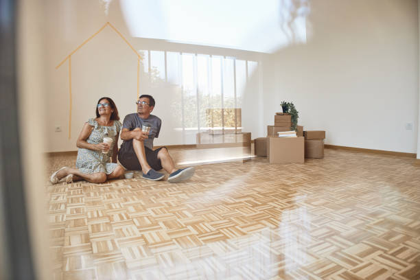 istock Senior couple moving into new home 2193449093