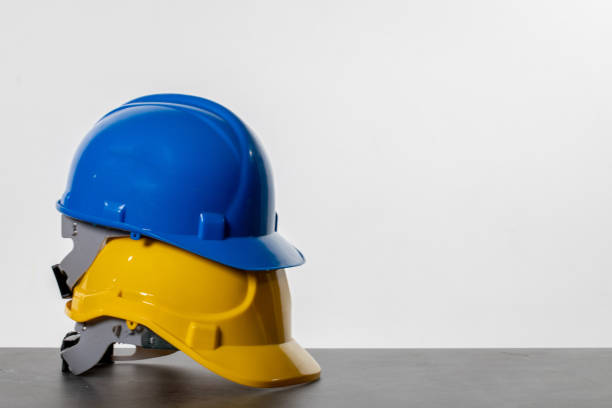 istock A Vibrant Array of Colorful Construction Helmets Neatly Stacked on a Countertop Surface 2193450996