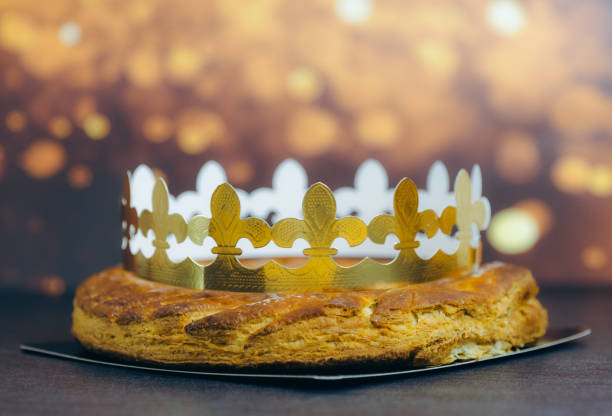 istock Almond royal galette with crown on stone table with bokeh. 2193452920