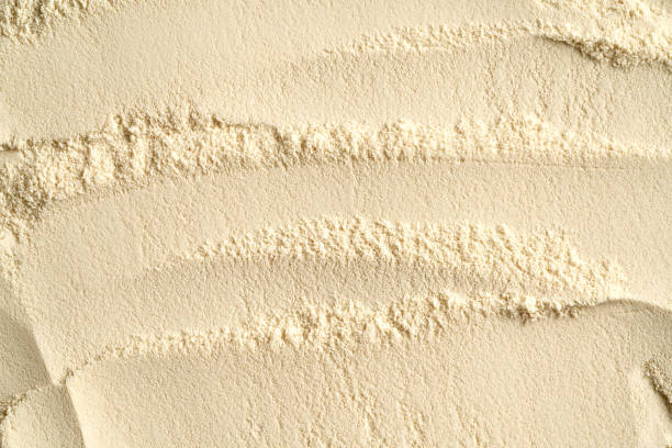 istock Whey protein powder as textured background, top view 2193455739