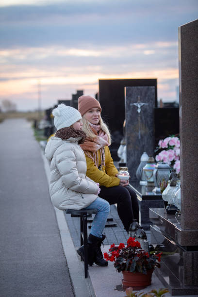 istock Experiencing Reflective Moments at the Cemetery During a Beautiful Sunset Evening 2193456349