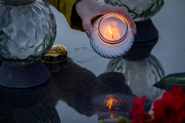 istock Candlelight Memorial Reflection is a profound event symbolizing love, honor, and remembrance 2193457259