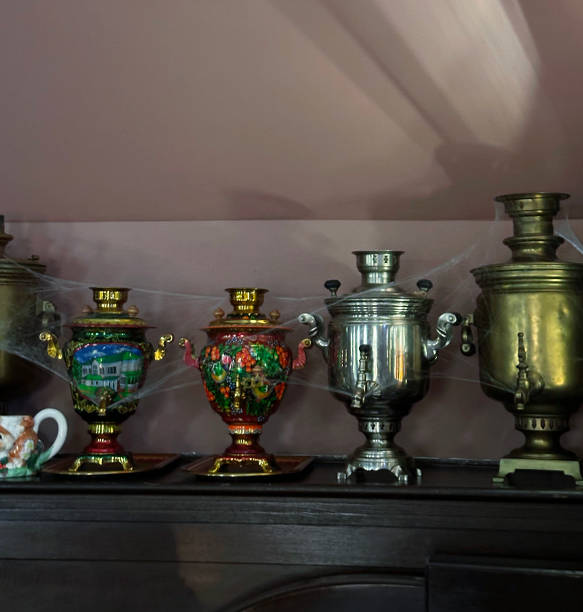 istock ancient samovars or metal kettles in a web 2193459744