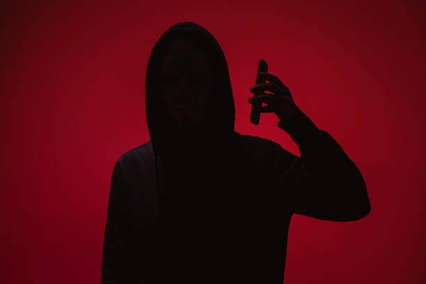 Silhouette on red background Silhouette on red background hoax stock pictures, royalty-free photos & images