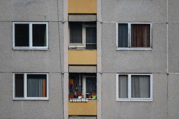 istock Urban apartment facade with balcony and windows 2193461118