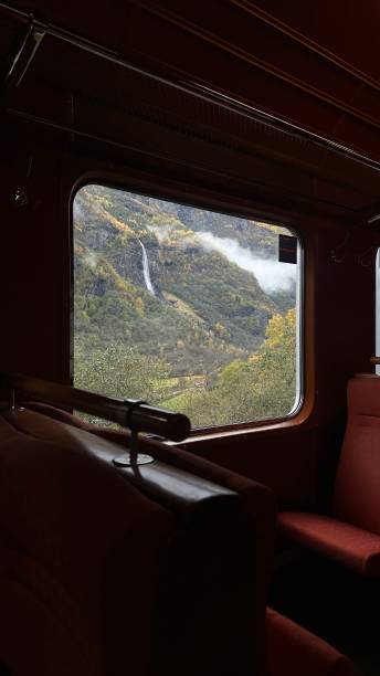 istock View from the  train window to mountains and fog at Norway 2193467049