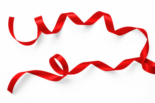 istock Red satin bow ribbon scroll set isolated on white background with clipping path for Christmas holiday and wedding anniversary card confetti design decoration 2193470266