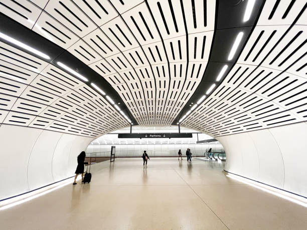 18 December 2024 - Victoria Cross Metro Station, Sydney, Australia: commuters make their way through the vast hall and corridors of the futuristic new architecture of the Victoria across Metro station in North Sydney