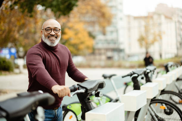 istock Mature Hispanic man using an e-bike for city commuting 2193470353