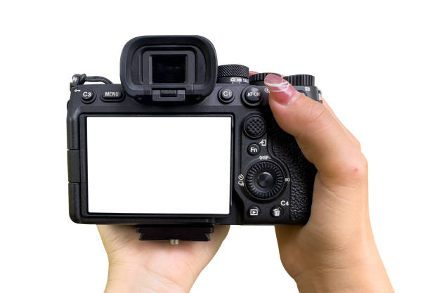 istock Hand holding Mirrorless camera with white screen isolated on white background. clipping path 2193471107