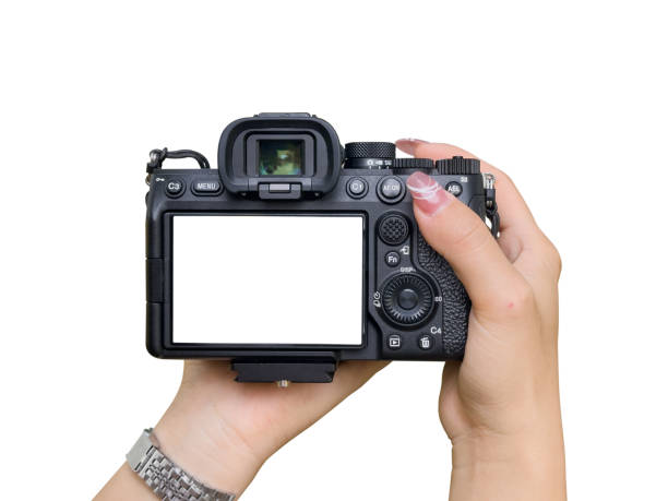 istock Hand holding Mirrorless camera with white screen isolated on white background. clipping path 2193471109