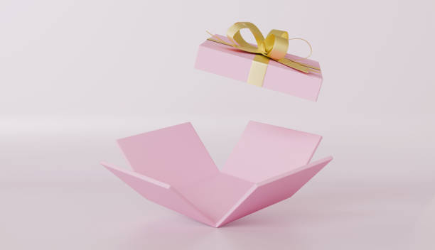 istock Pink Gift Box with Gold Bow Falling into Open Box Surprise Present Concept 2193474499