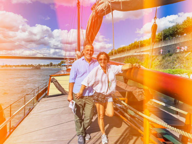 Dusseldorf, near rhine. Couple posing in lomo style photo. Lomo photograhy is a technique that emulates old-style, especially Russian-made cameras. Lens and color distortions are the prominent features of this technique.