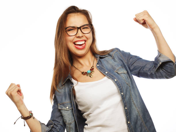istock happy excited woman celebrating her success. 2193477470