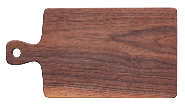istock Handmade black walnut wood cutting board on white background. Handmade wooden chopping board. wooden chopping board isolated. wooden board isolated on white background 2193479426
