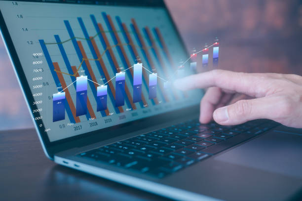 istock businessman using computer laptop working with data charts investment financial concept finance data analytics graph.Financial management technology.Advisor using KPI Dashboard on virtual screen 2193492454