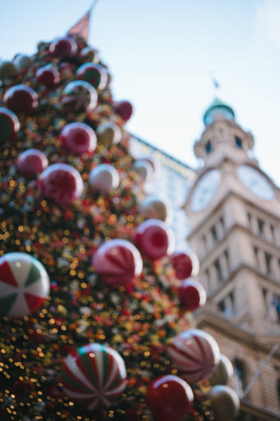 istock Blurred decorated Christmas tree with Decorations Blurred lights shining, Merry Christmas Background, Christmas Tree With Ornament And bokeh Lights 2193493653
