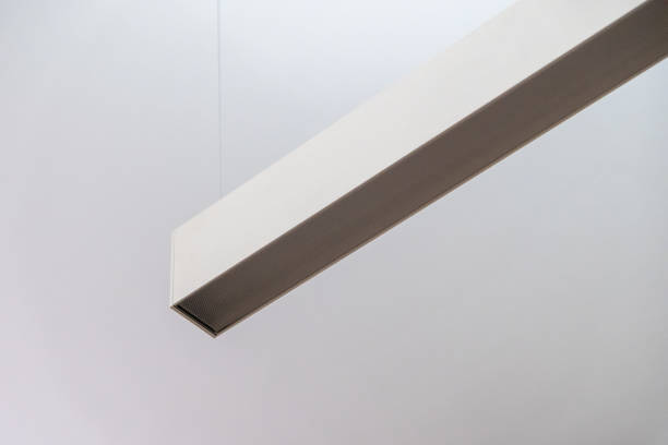 istock Suspended linear profile lighting featuring a prismatic cover, designed to provide uniform and glare-free illumination, ideal for modern office environments. 2193495159