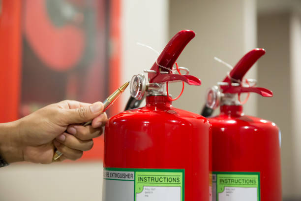istock Engineer are inspection check fire extinguisher for emergency rescue and safety training concept. 2193495555
