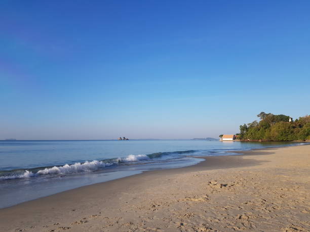 istock Serene Tropical Beach at Sunrise 2193496347