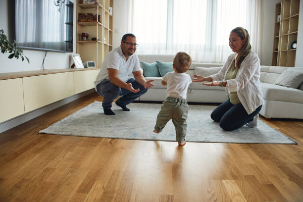 istock First steps of our baby 2193497525