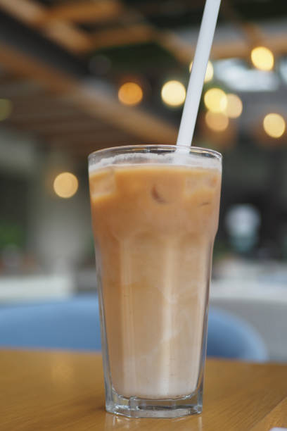 istock iced late in a transparent glass on cafe table 2193502758
